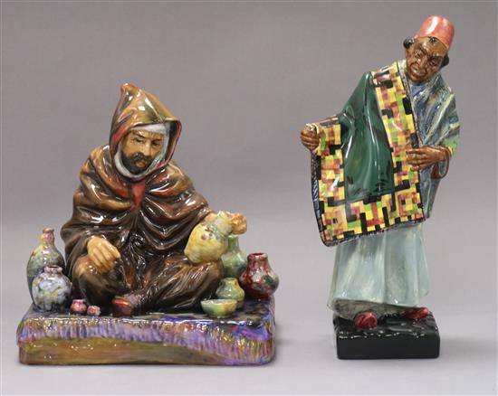 Two Royal Doulton figures: The Carpet Seller HN1464 and Royal Doulton The Potter HN1493 tallest 22.5cm